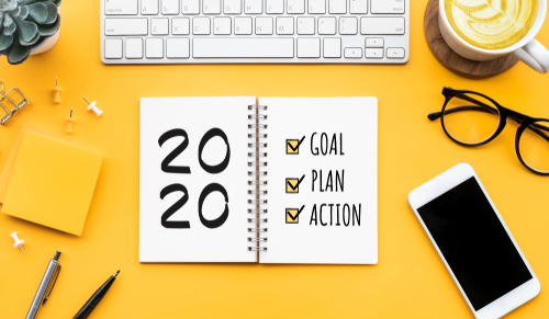 2020 new year goal_plan_action text on notepad with office accessories.Business motivation_inspiration concepts ideas